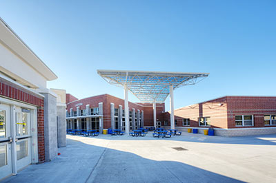 A Case Study on Facility Design: The Impact of New High School Facilities in Virginia on Student Achievement and Staff Attitudes and Behaviors